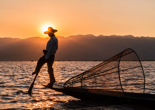 Sunset Fisherman 1000 Piece Jigsaw Puzzle by Passport Puzzles